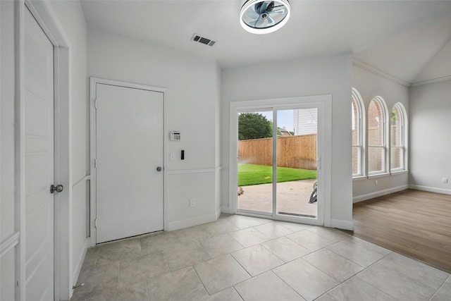 4309 Cutter Springs Ct, Plano, TX 75024 - foyer entrance featuring lofted ceiling, light tile patterned floors, and baseboards