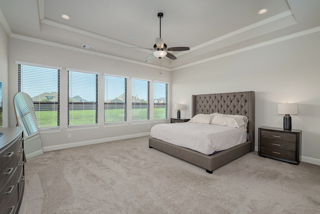 8220 Stonewall Dr, Waxahachie, TX 75167 - bedroom with a tray ceiling, light colored carpet, multiple windows, and crown molding