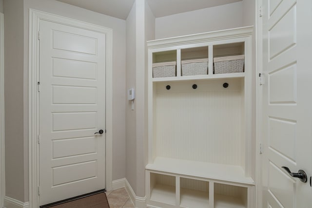 8220 Stonewall Dr, Waxahachie, TX 75167 - mudroom featuring light tile patterned floors and baseboards