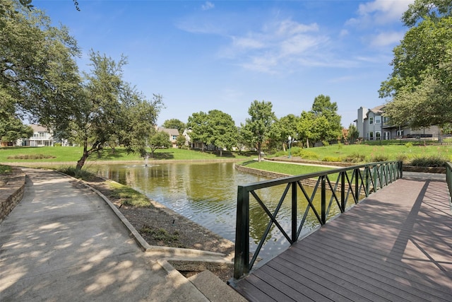 1084 Leisure Ln, Irving, TX 75063 - dock with a water view and a lawn