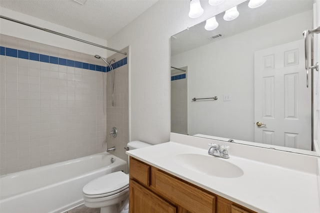 1084 Leisure Ln, Irving, TX 75063 - full bath featuring vanity, tub / shower combination, and a textured ceiling