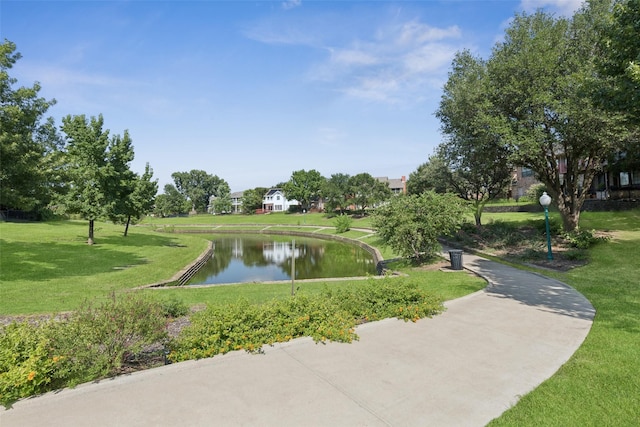 1084 Leisure Ln, Irving, TX 75063 - view of property's community featuring a water view and a lawn