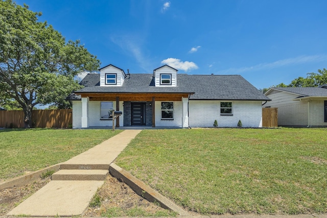 703 E Center St E, Duncanville, TX 75116 - cape cod home with brick siding and roof with shingles
