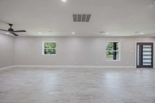 703 E Center St E, Duncanville, TX 75116 - spare room with plenty of natural light, recessed lighting, baseboards, and ceiling fan
