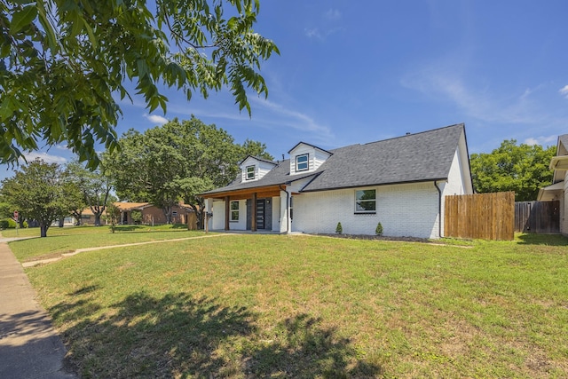 703 E Center St E, Duncanville, TX 75116 - cape cod house with brick siding and a shingled roof