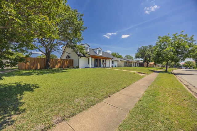 703 E Center St E, Duncanville, TX 75116 - view of front of property with a garage