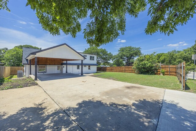 703 E Center St E, Duncanville, TX 75116 - view of property exterior featuring driveway, central AC unit, and an attached carport