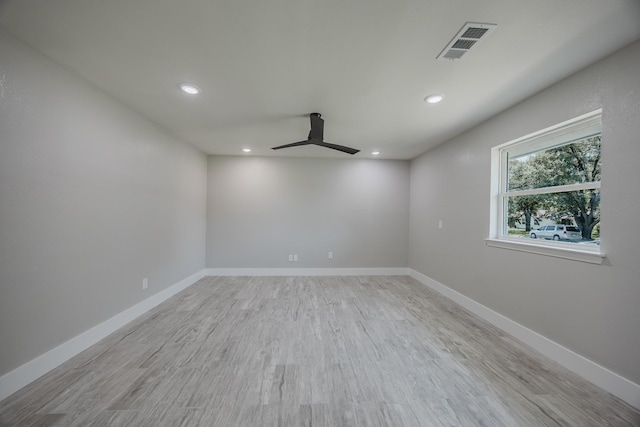 703 E Center St E, Duncanville, TX 75116 - unfurnished room featuring ceiling fan, recessed lighting, light wood-style floors, and baseboards