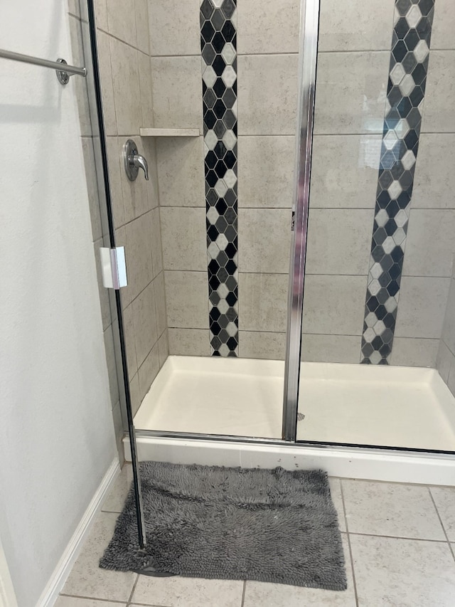 1311 Rosler St, Mansfield, TX 76063 - full bath featuring tile patterned flooring, a shower stall, and baseboards
