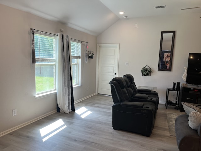 1311 Rosler St, Mansfield, TX 76063 - living area featuring vaulted ceiling, baseboards, and light wood-style floors