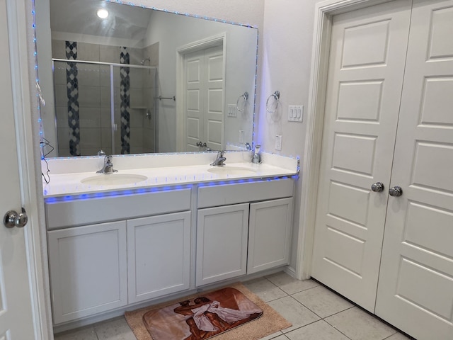 1311 Rosler St, Mansfield, TX 76063 - bathroom featuring tile patterned floors, a stall shower, and double vanity