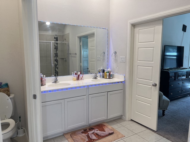 1311 Rosler St, Mansfield, TX 76063 - full bath with double vanity, a shower stall, toilet, and tile patterned flooring