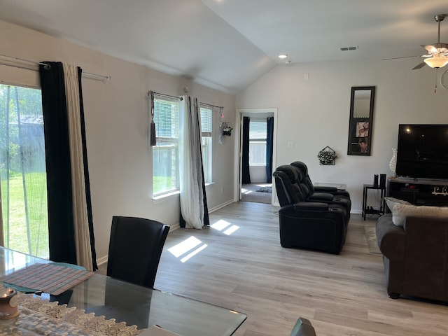 1311 Rosler St, Mansfield, TX 76063 - living area with healthy amount of natural light, a ceiling fan, lofted ceiling, baseboards, and light wood-style flooring
