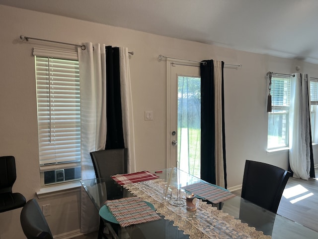 1311 Rosler St, Mansfield, TX 76063 - dining area featuring wood finished floors and plenty of natural light