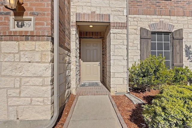 1409 Nicholas Ln, Little Elm, TX 75068 - entrance to property featuring stone siding and brick siding