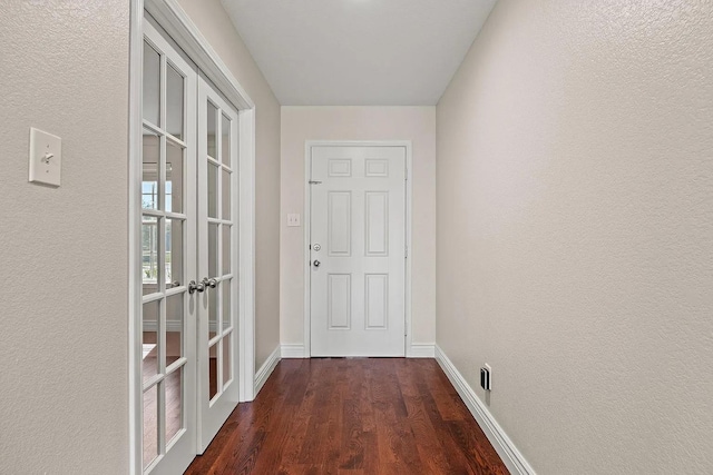 1409 Nicholas Ln, Little Elm, TX 75068 - doorway to outside with baseboards, wood finished floors, and a textured wall