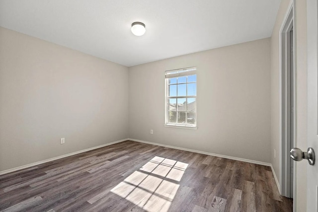 1409 Nicholas Ln, Little Elm, TX 75068 - unfurnished room with wood finished floors and baseboards