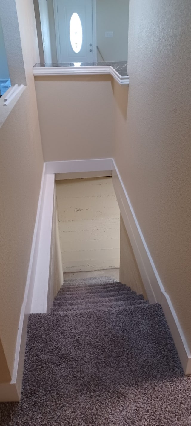 5301 Bonnell Ave, Fort Worth, TX 76107 - staircase featuring a textured wall