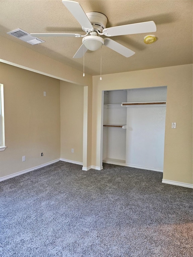 5301 Bonnell Ave, Fort Worth, TX 76107 - unfurnished bedroom featuring dark carpet, a ceiling fan, and baseboards