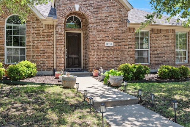 12712 Greenhaven Dr, Frisco, TX 75035 - property entrance with brick siding and roof with shingles