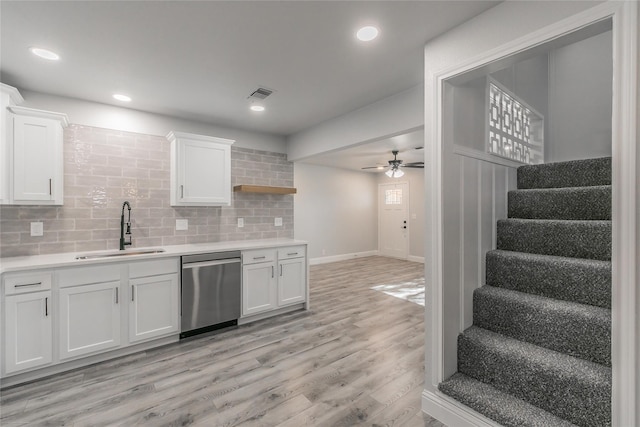 4328 Diaz Ave, Fort Worth, TX 76107 - kitchen featuring a sink, stainless steel dishwasher, white cabinets, backsplash, and recessed lighting