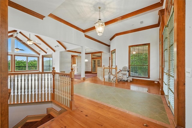 661 Diamond Point Dr, Oak Point, TX 75068 - hallway featuring crown molding, an upstairs landing, healthy amount of natural light, and wood finished floors