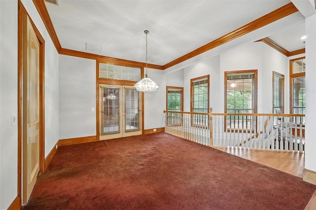 661 Diamond Point Dr, Oak Point, TX 75068 - spare room featuring crown molding, a chandelier, and carpet flooring