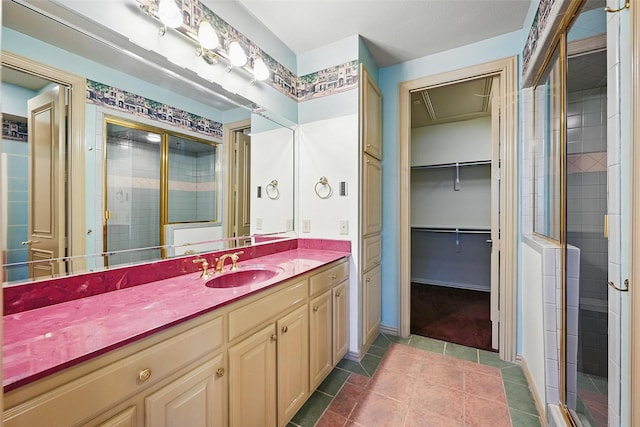 661 Diamond Point Dr, Oak Point, TX 75068 - bathroom with vanity, a shower stall, a walk in closet, and tile patterned floors