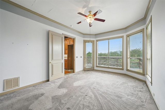 661 Diamond Point Dr, Oak Point, TX 75068 - unfurnished room with light colored carpet, ornamental molding, and a ceiling fan