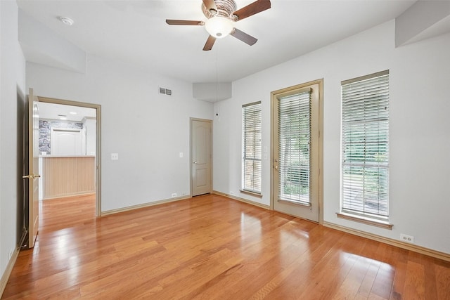 661 Diamond Point Dr, Oak Point, TX 75068 - spare room featuring a smoke detector, light wood-type flooring, and a ceiling fan