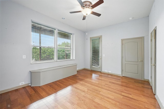 661 Diamond Point Dr, Oak Point, TX 75068 - empty room featuring light wood-type flooring, a ceiling fan, and a smoke detector