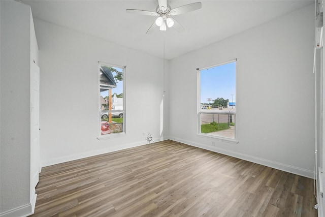710 W Owing St, Denison, TX 75020 - empty room featuring wood finished floors and a ceiling fan