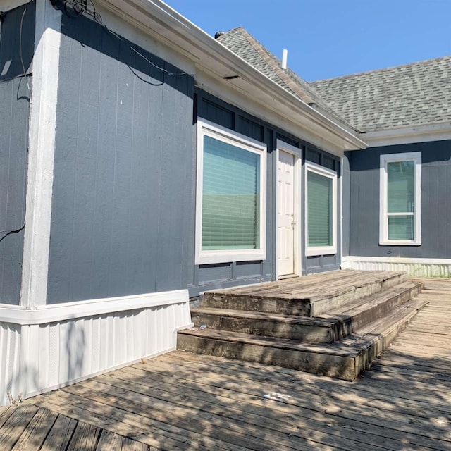 710 W Owing St, Denison, TX 75020 - entrance to property with a deck and a shingled roof