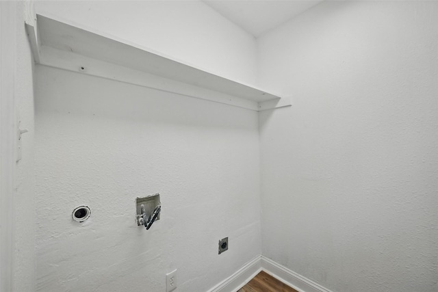 710 W Owing St, Denison, TX 75020 - laundry room featuring hookup for an electric dryer and dark wood-style floors