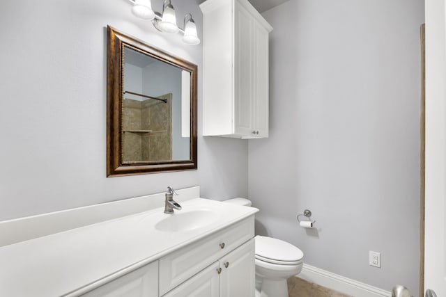 307 Sagebrush Dr, Oak Point, TX 75068 - full bathroom with vanity, toilet, a shower, baseboards, and tile patterned flooring