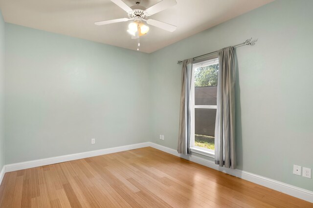 307 Sagebrush Dr, Oak Point, TX 75068 - spare room featuring light wood finished floors, baseboards, and ceiling fan