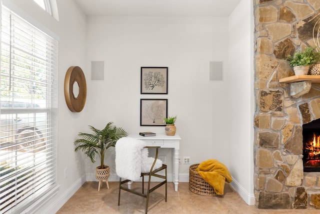 307 Sagebrush Dr, Oak Point, TX 75068 - office space featuring a stone fireplace and baseboards