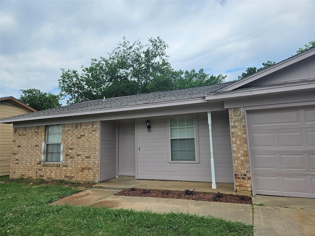 2916 S Miller Ave, Fort Worth, TX 76105 - view of front of house featuring a garage, brick siding, and roof with shingles