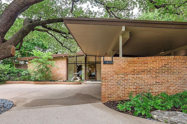 4335 Rawlins St, Dallas, TX 75219 - doorway to property featuring brick siding