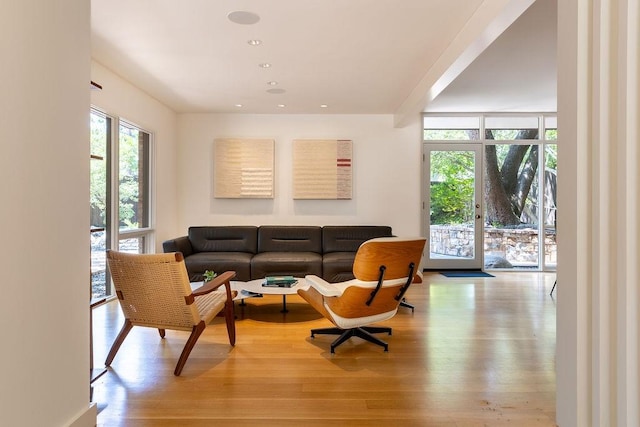 4335 Rawlins St, Dallas, TX 75219 - living room featuring wood finished floors and recessed lighting