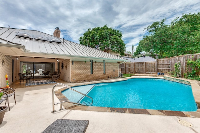 206 Crooked Creek Dr, Richardson, TX 75080 - view of swimming pool with a patio and a fenced backyard
