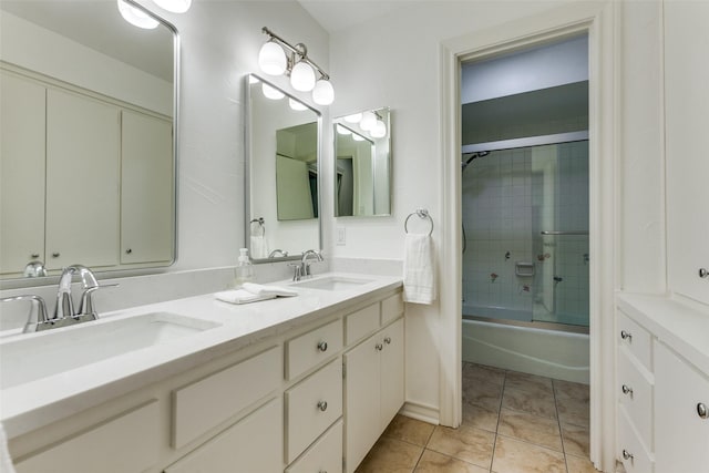 206 Crooked Creek Dr, Richardson, TX 75080 - full bath featuring double vanity, enclosed tub / shower combo, and tile patterned flooring