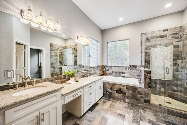990 Cornelius Rd, Rockwall, TX 75087 - bathroom with a shower stall, a bath, double vanity, and recessed lighting