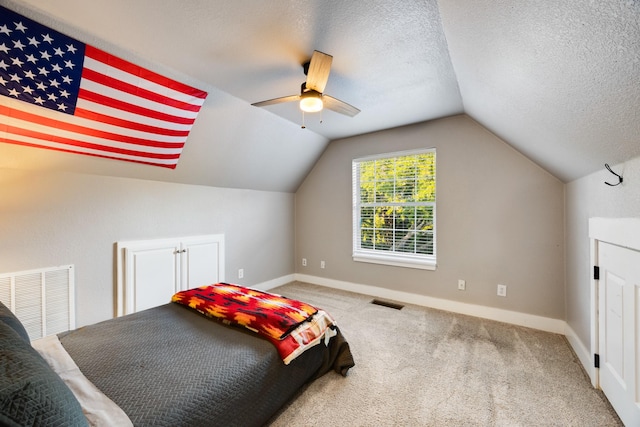 990 Cornelius Rd, Rockwall, TX 75087 - carpeted bedroom featuring baseboards, lofted ceiling, a ceiling fan, and a textured ceiling