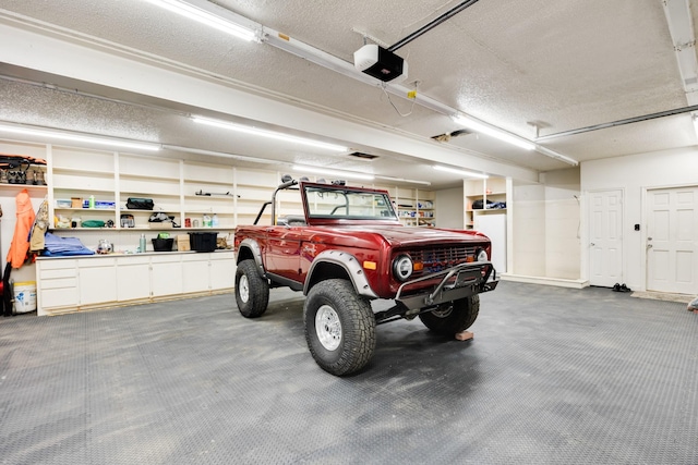 990 Cornelius Rd, Rockwall, TX 75087 - garage with a garage door opener