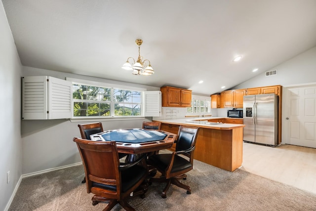 990 Cornelius Rd, Rockwall, TX 75087 - dining area featuring a chandelier, light colored carpet, lofted ceiling, recessed lighting, and baseboards