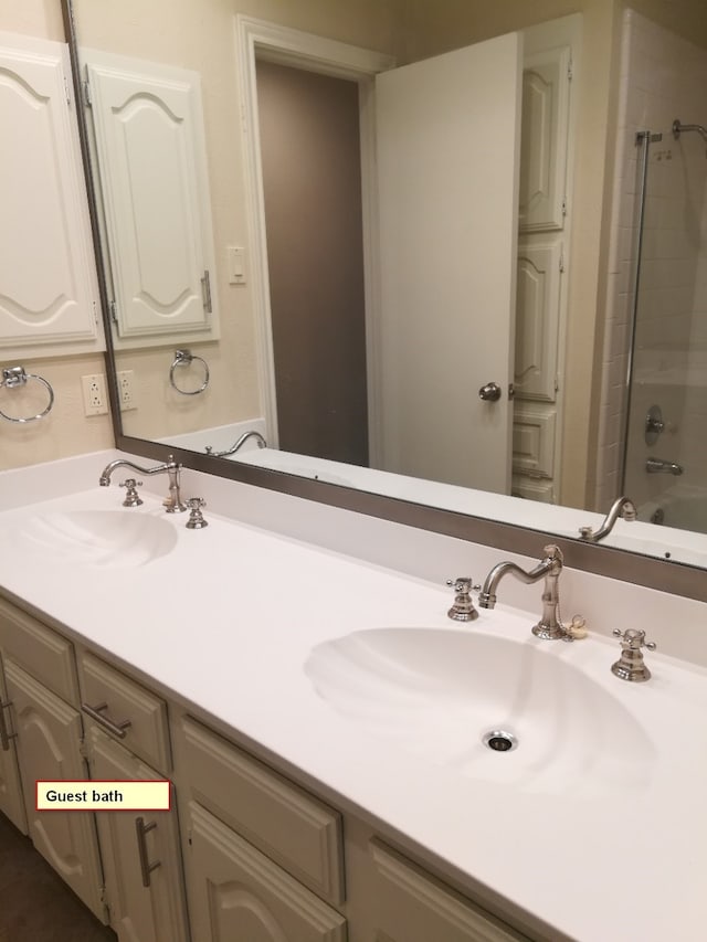 1211 Oriental Ave, Arlington, TX 76011 - bathroom with double vanity and shower / bath combination