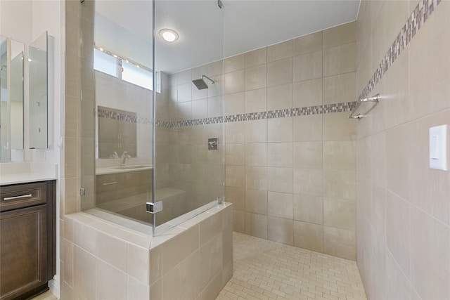 9921 Flint Way, Denton, TX 76207 - bathroom featuring a tile shower and vanity