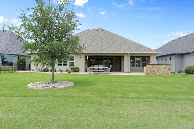 9921 Flint Way, Denton, TX 76207 - rear view of property featuring a patio, stucco siding, and a shingled roof