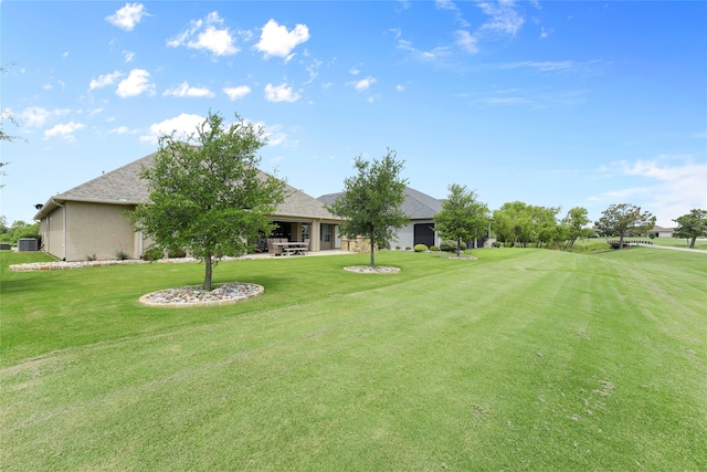 9921 Flint Way, Denton, TX 76207 - view of grassy yard featuring central AC